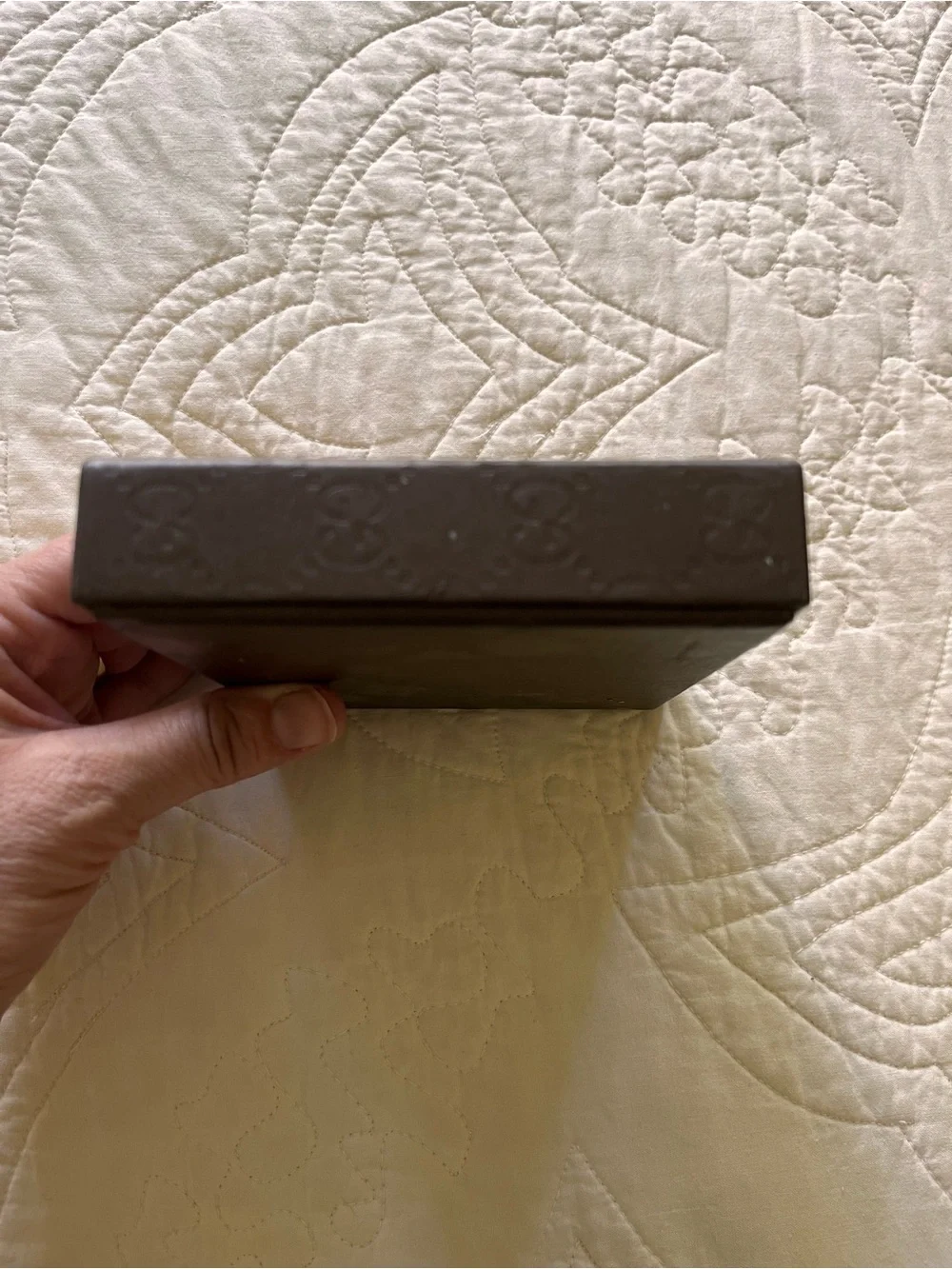 Gucci embossed pattern
